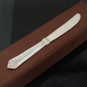 VINTAGE ORNATE HANDLE BUTTER KNIFE IN STERLING SILVER