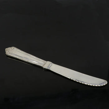 VINTAGE ORNATE HANDLE BUTTER KNIFE IN STERLING SILVER