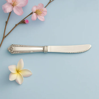 VINTAGE ORNATE HANDLE BUTTER KNIFE IN STERLING SILVER