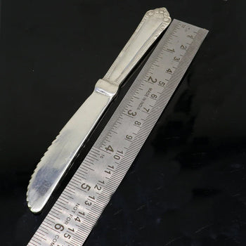 VINTAGE ORNATE HANDLE BUTTER KNIFE IN STERLING SILVER