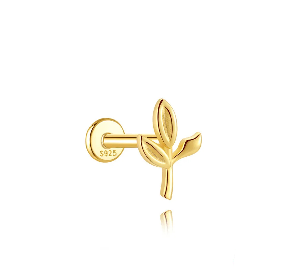 Gold leaf-shaped earring on a white background