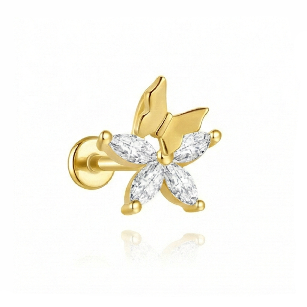 Gold butterfly earring with clear gemstones on a white background
