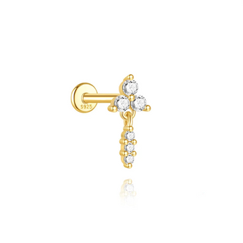 Gold earring with clear gemstones on a white background
