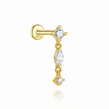 Gold earring with clear gemstones on a white background