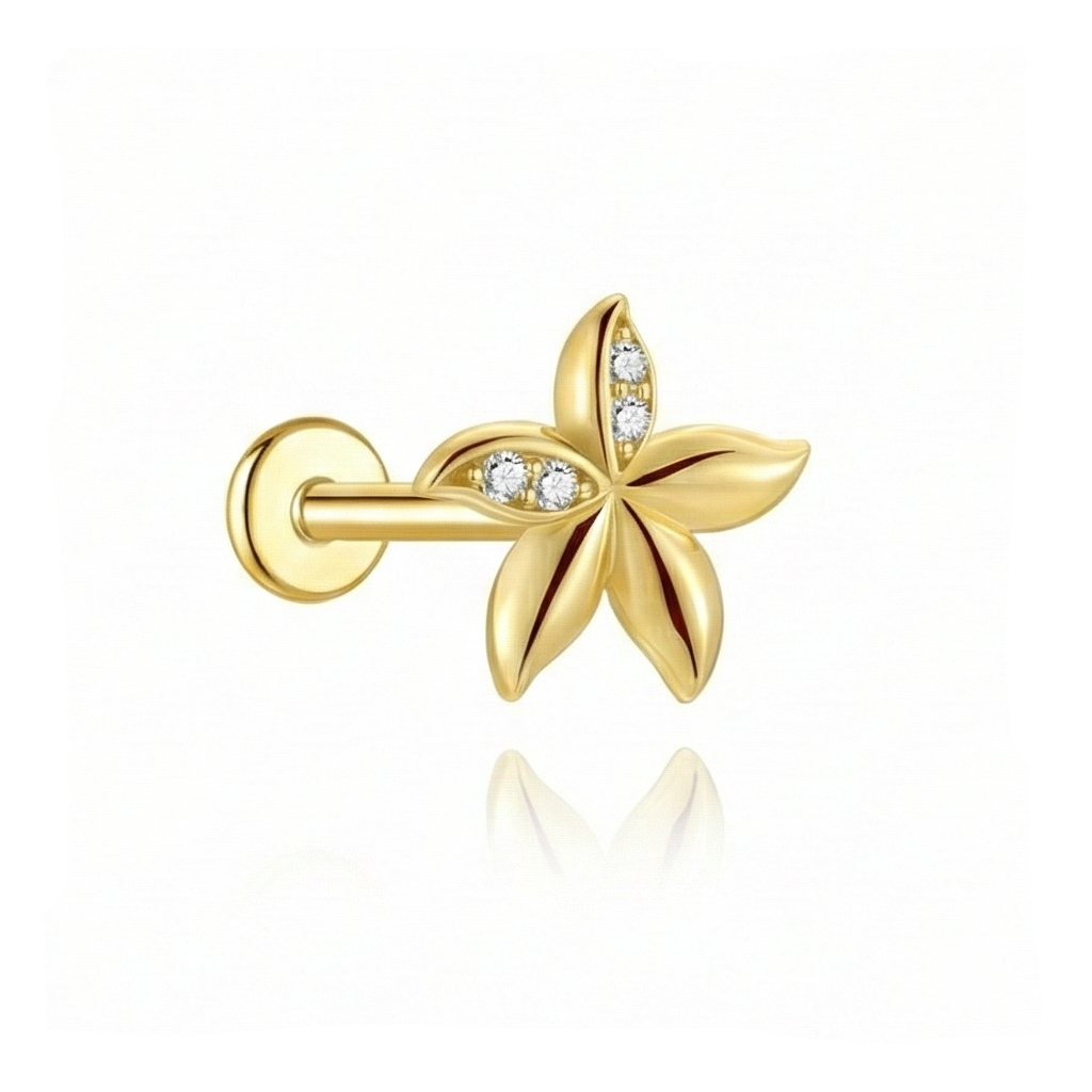 Gold earring with leaf design and embedded diamonds on a white background