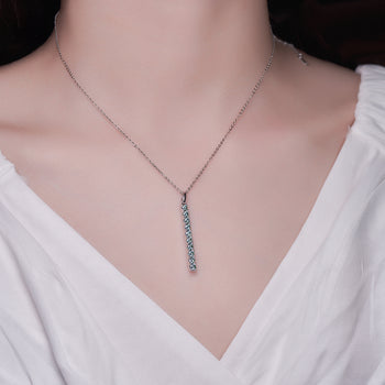 WHITE GOLD PLATED ROUND CUT COLORED MOISSANITE PENDANT IN STERLING SILVER